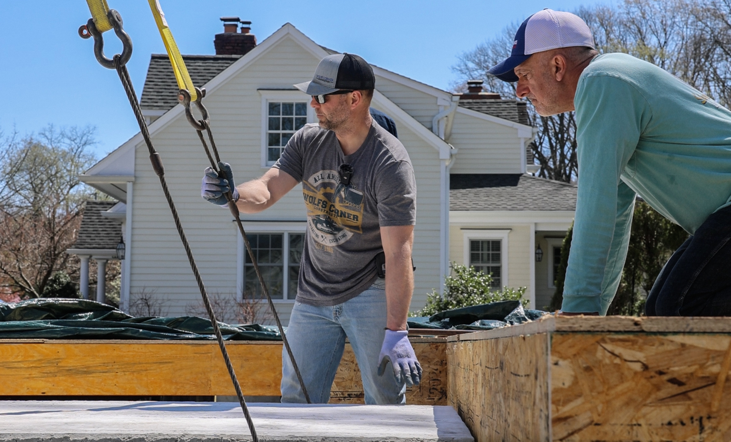 Workers with rigging equipment
